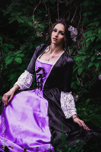 Lady in black and purple baroque dress
