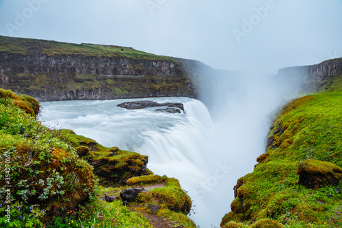 Dramatic view of the powerful Gullfoss waterfall. Location place canyon of the Hvita river, Iceland, Europe.