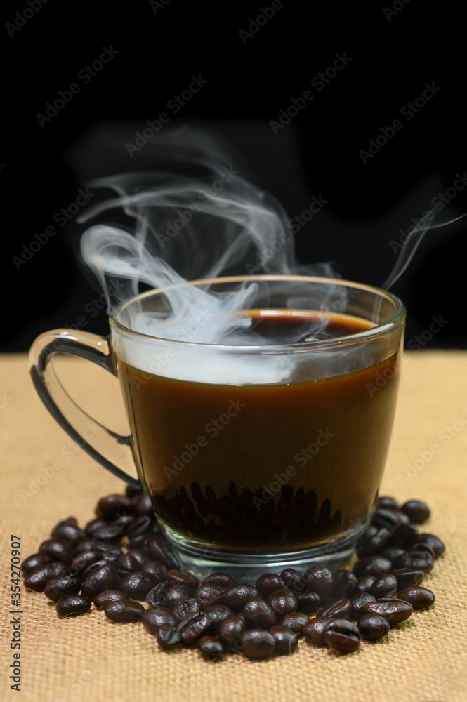 Coffee with a grain of black background Coffee with a grain of black background
