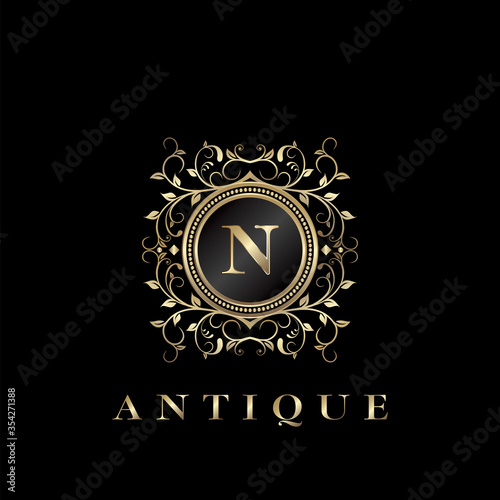 Circle Nature Leaf Luxury Letter N logo. Antique elegance vector design floral ornament on circle frame with gold vintage . Vector logo template, wedding labels and badges