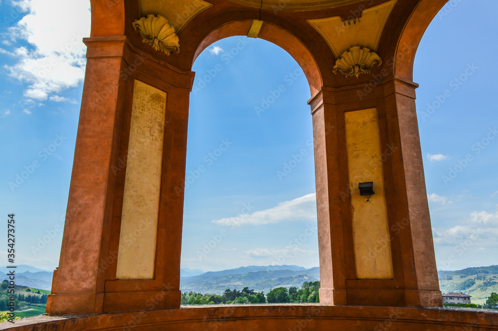 The hills around Bologna as seen through an arch of the 