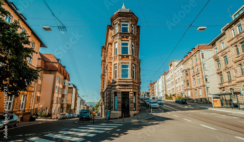 Stuttgart, Germany, June, 2015, Flat building in center of street inside stuttgart city at eugensplatz square, a popular meeting place for people.