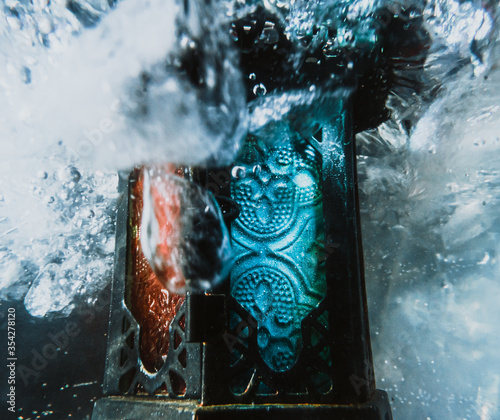 Colourful portal sank on icy water