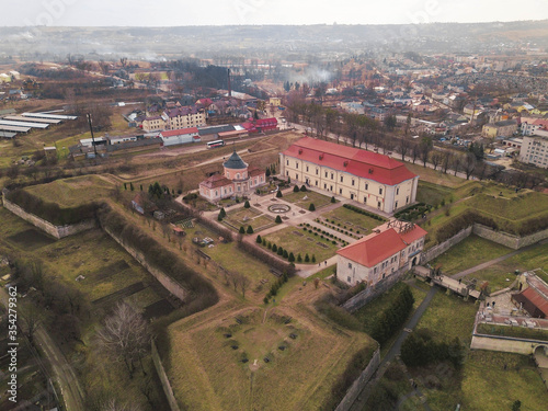 View of the old castle on sunny day against the blue sky in Zolochiv, Lviv region in Ukraine.