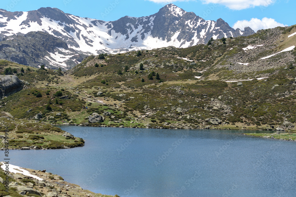 Beautiful view hiking in the Andorra Pyrenees Mountains in Ordino, near the Lakes of Tristaina