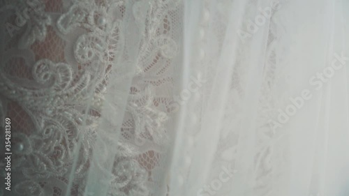 details of the bride in the wedding dress