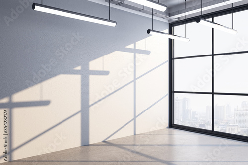 Modern office hall with blank wall and panoramic city view.