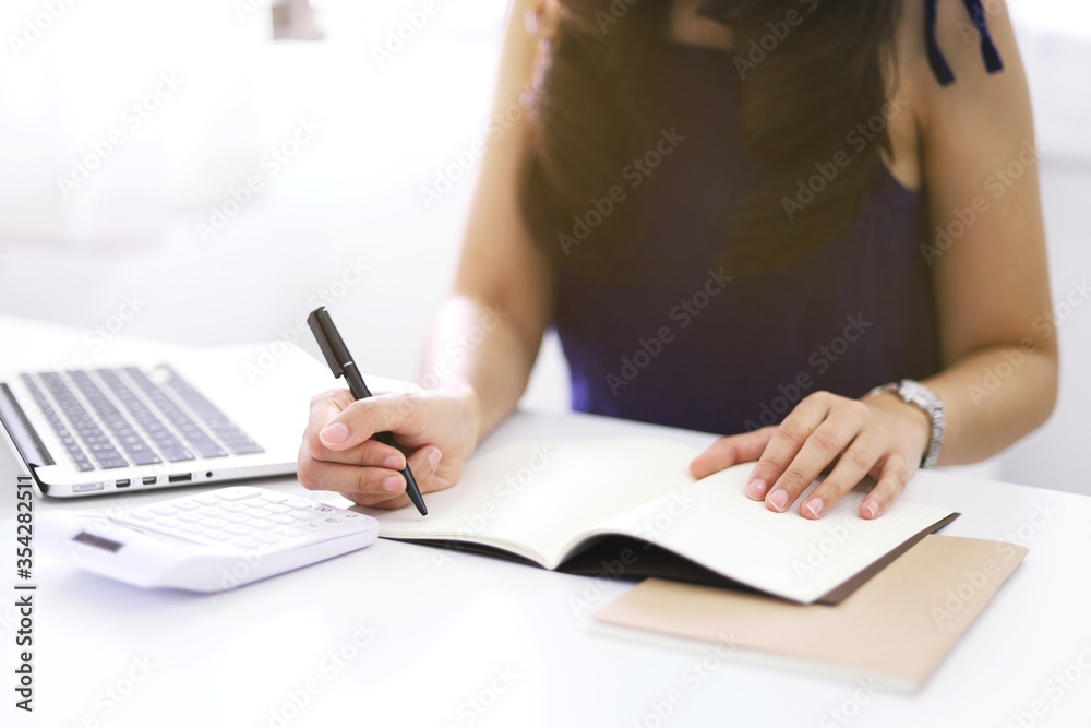 Online studying class for E learning. Smart student girl sitting at table watching lesson online and studying from home. Stay home stay safe Online studying class for E learning. Smart student girl sitting at table watching lesson online and studying from home. Stay home stay safe