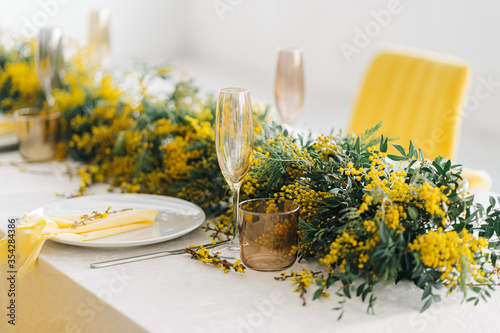 Mimosa flower dinner table set up