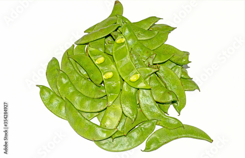 Heap of fresh Jack bean or Canavalia gladiata on white background.