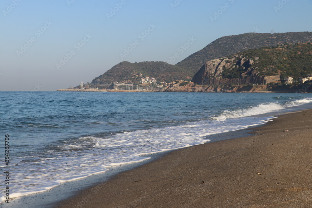 View of the beach, waves on the beach, turkey, alanya, Mediterranean sea