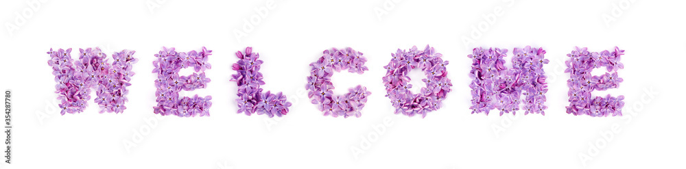 Fototapeta premium Welcome - The text is made up of lilac flowers. Congratulation, header, postcard.