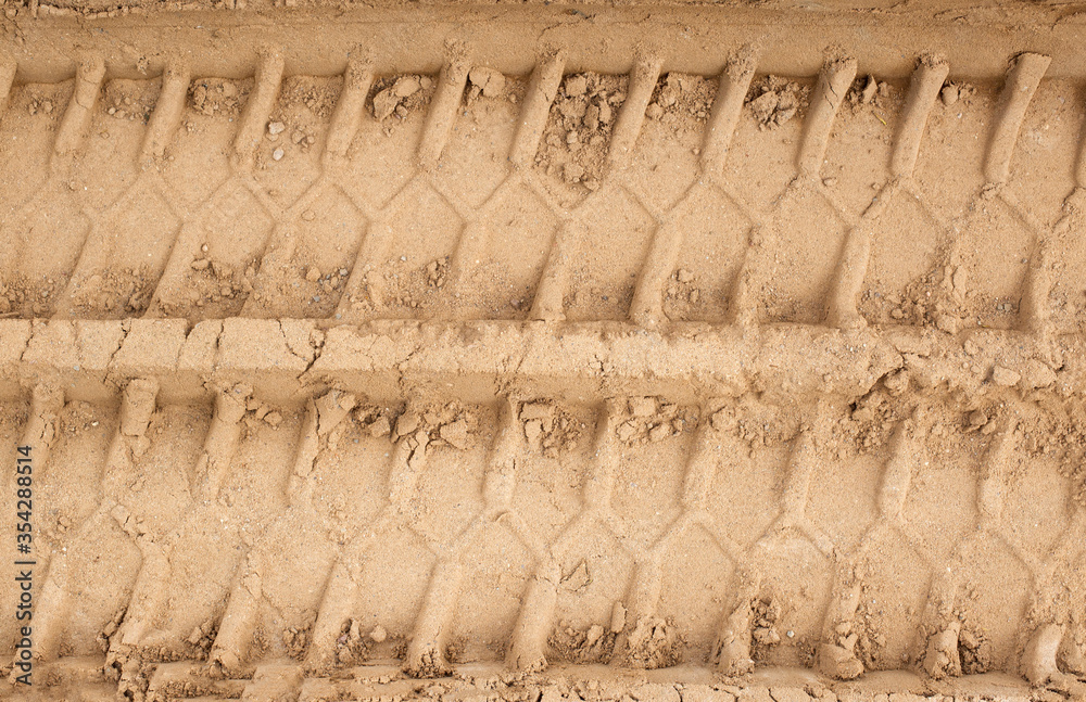 Track from the tread of a wheel of a truck and construction equipment, close-up, background