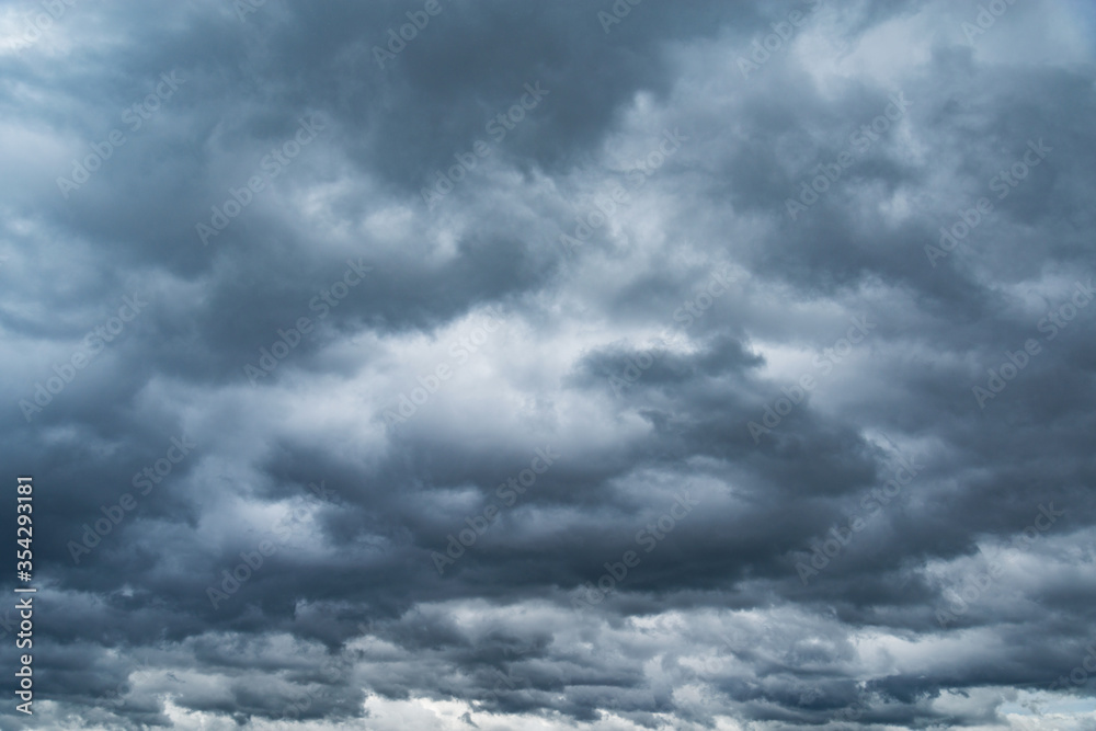 Dark storm clouds before the rain at day time.