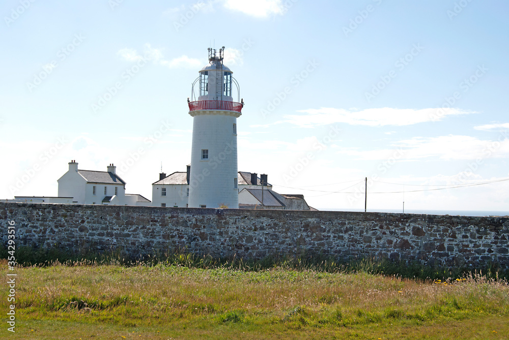 Lighthouse on a cliff in Howth, Ireland