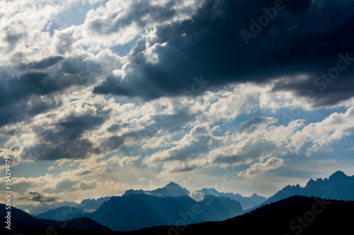 A landscape of Picos de Europa, in Spain with a cloudy sky.
