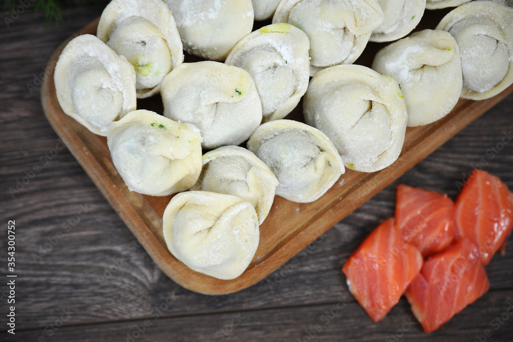 Dumplings manual molding. Rustic food. Selective focus. Dumplings manual molding. Rustic food. Selective focus.