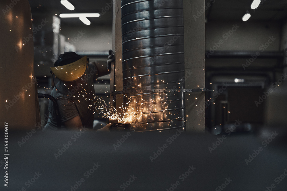 Installation work indoors with sparks