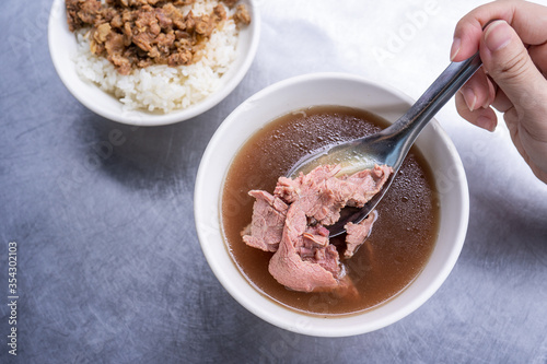 Beef soup - famous food in Taiwan, Asia, Asian Taiwanese street delicacy cuisine, close up, lifestyles, traditional breakfast in Tainan.