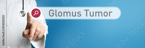 Glomus Tumor. Doctor in smock points with his finger to a search box. The term Glomus Tumor is in focus. Symbol for illness, health, medicine photo