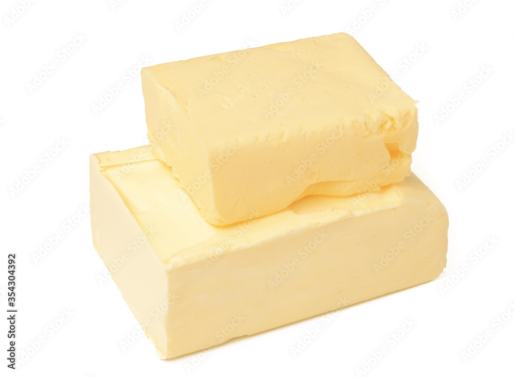 Block of butter isolated on white background