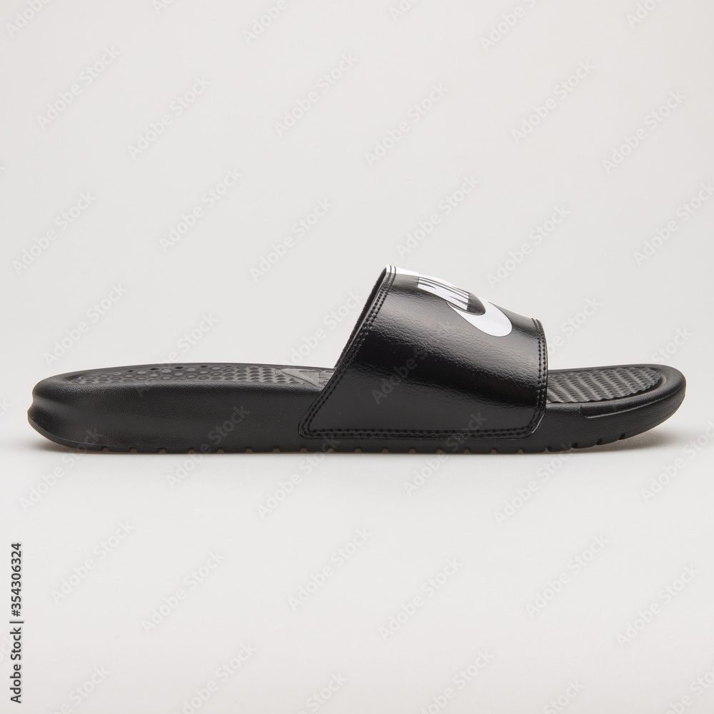 VIENNA, AUSTRIA - MAY 27, 2018: Nike Benassi JDI black and white sandal on  white background. Stock Photo | Adobe Stock