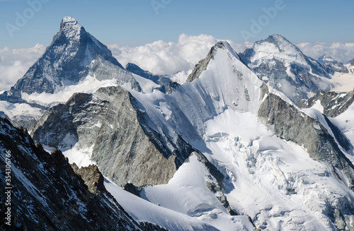 View of peaks in Swiss Alps in sunny summer day