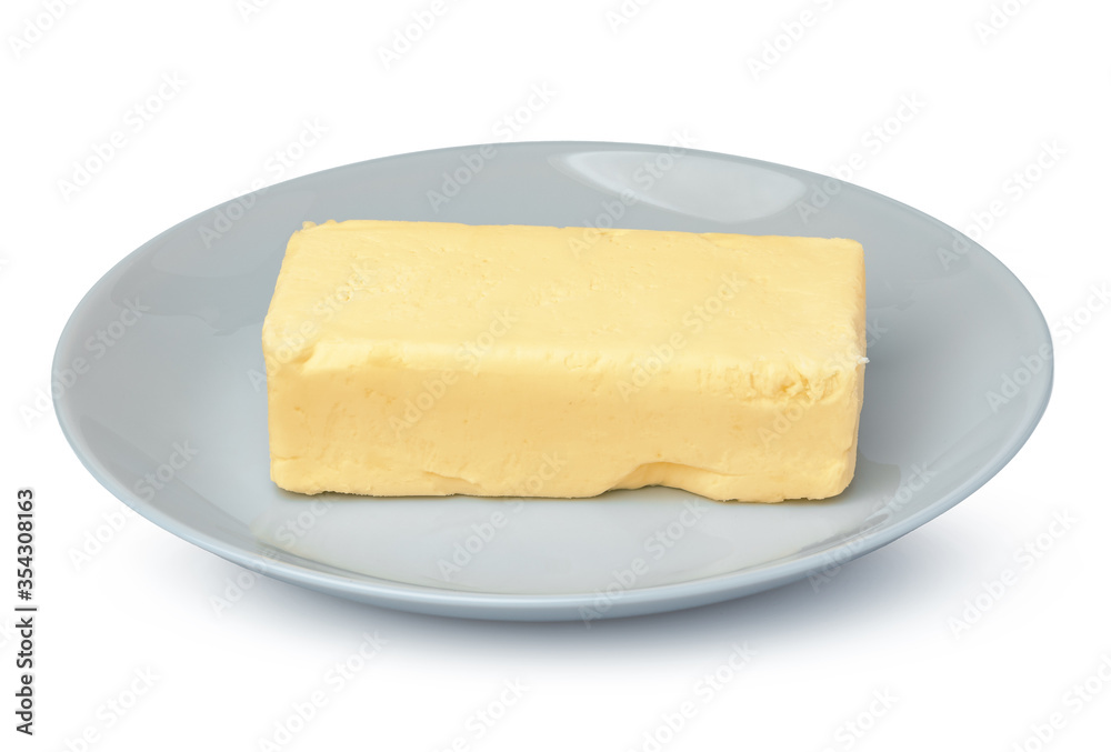 Butter on white plate isolated on white background