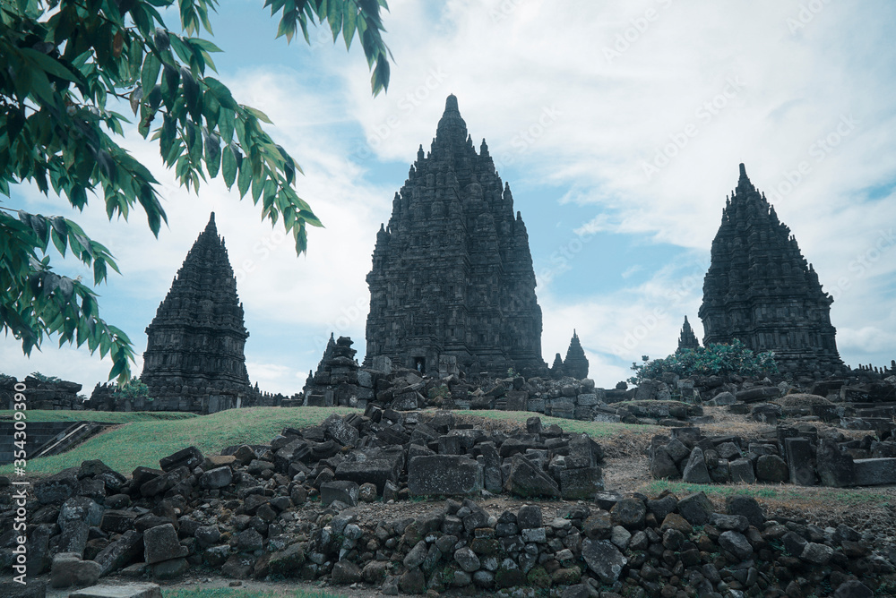 Yogyakarta Indonesia, June 4 2020 : Prambanan temple is a Hindu temple compound included in world heritage list in the night. Monumental ancient architecture, carved stone walls. Yogyakarta Indonesia, June 4 2020 : Prambanan temple is a Hindu temple compound included in world heritage list in the night. Monumental ancient architecture, carved stone walls.
