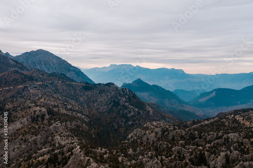 Antalya, Gundogmus. Landscape with picturesque view, rocky land and mountains with morning sky in background. Stability and earth power
