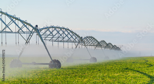 Foto Moved irrigation system on a farmer's field