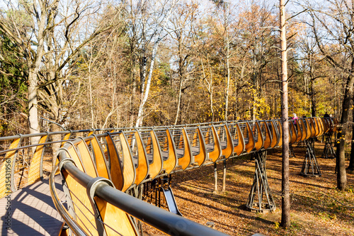 Russia, Moscow: Aerial ecological trail among tree crowns, VDNH park, autumn.