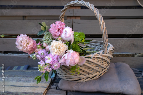 Flowers in a flower basket in a flower shop. Flower delivery. Flower sales. Flower market. Retail sale of flowers