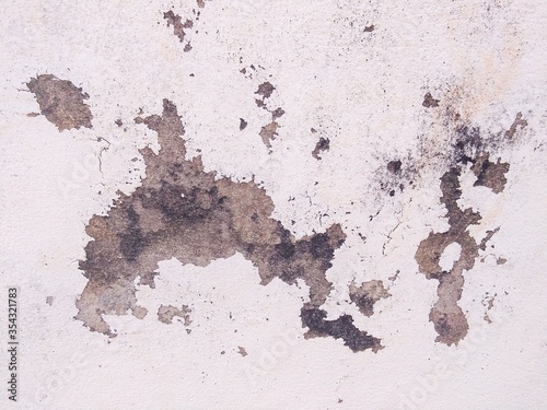Abstract background of concrete & cement plaster painted wall or distressed yellow brown old brick floor of industrial construction building with stain peeling surface, dirty house exterior concept  