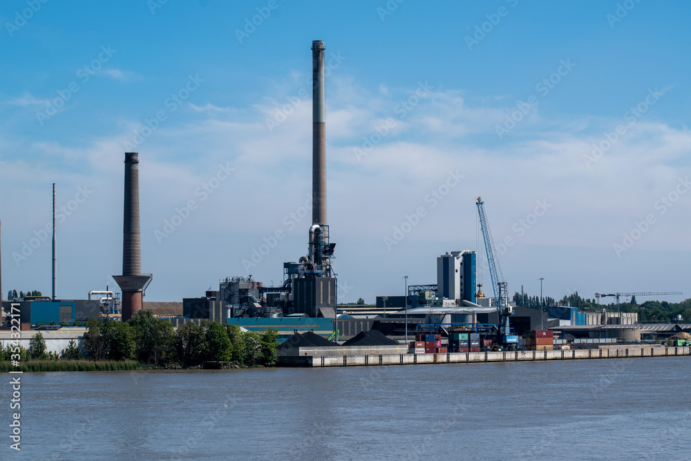 Heavy industry in the port of Antwerp in the rive Scheldt. Belgium