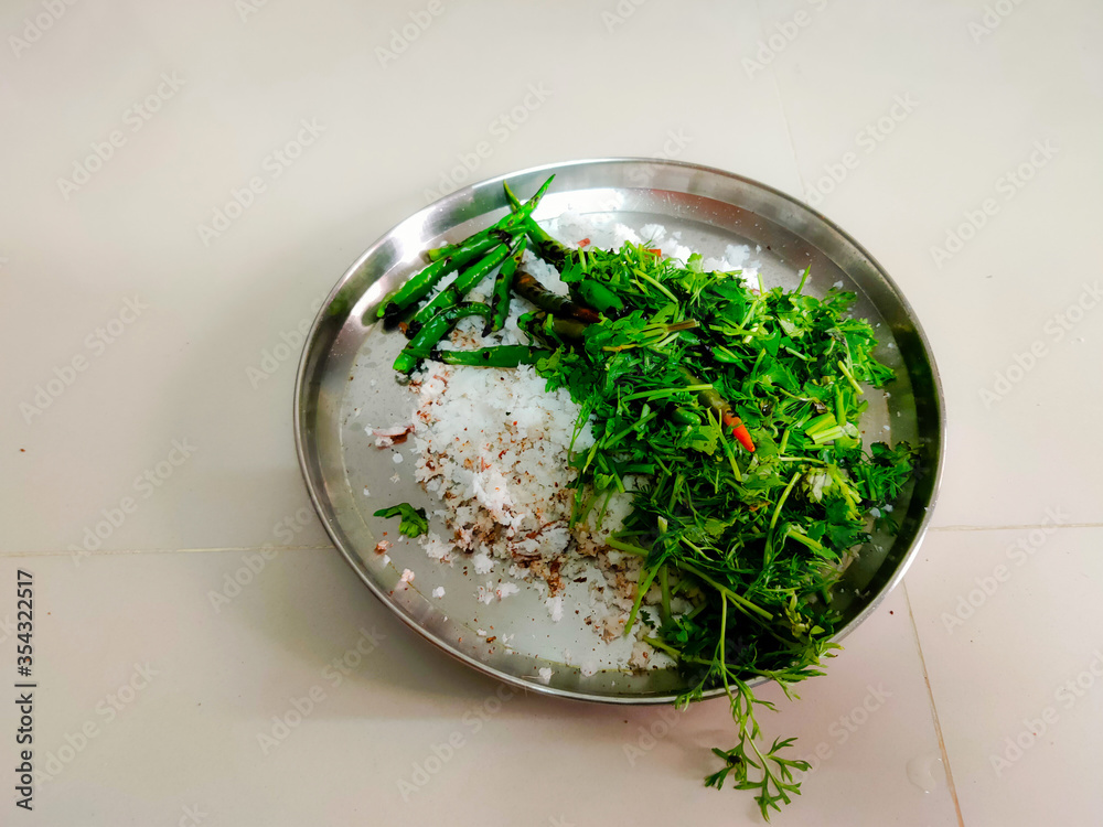 grated coconut with coriander and green chillies grated coconut with coriander and green chillies