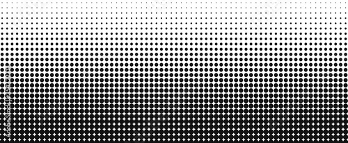 Vertical gradient of black and white dots. Halftone texture. Vector illustration. Monochrome dots background.