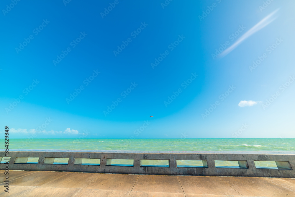 Higgs Beach pier under a blue sky