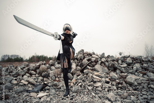 cosplay woman lunges with a sword