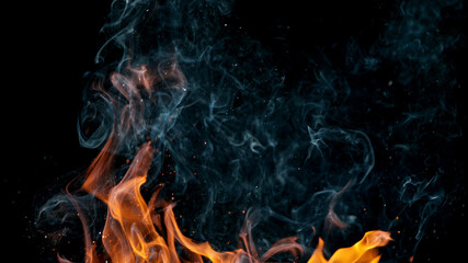 fire flames with sparks on a black background, close-up