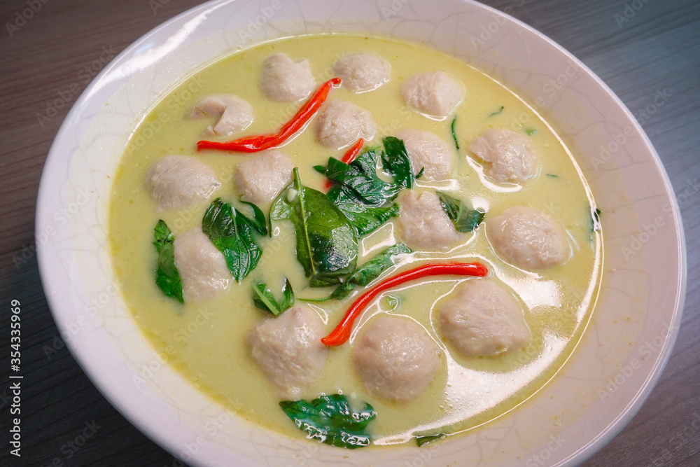 traditional real Thai culture Green curry paste cuisine or kaeng khiao wan with crabs meat beef balls box set famous street fast foods menu at thailand on wood traditional real Thai culture Green curry paste cuisine or kaeng khiao wan with crabs meat beef balls box set famous street fast foods menu at thailand on wood