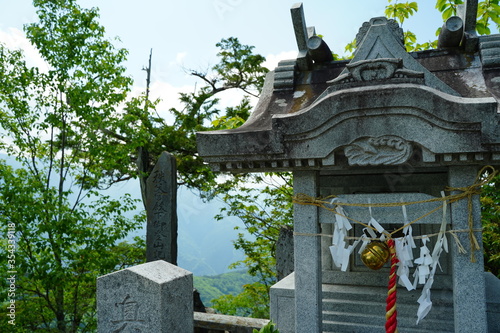 Komainu (shrine guardian animal statues) at Mitsumine Jinja Shrine at Chichibu, Tokyo, Japan.  This 