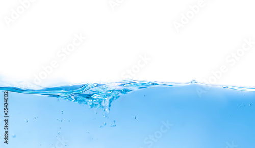 Clear water waves and bubbles separate on a white background.