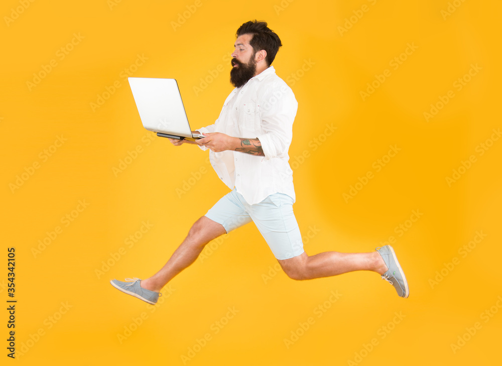 Always available. Bearded man run online business. Hipster work online in action. Freelance online. Online job. Business communication. Internet surfing. Digital marketing. New technology