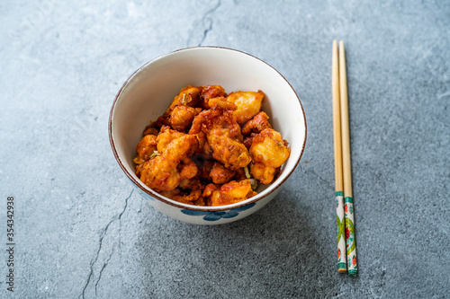 Stir Fry Mongolian Chicken with Chopsticks.