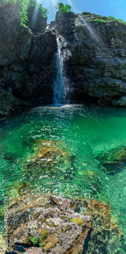 Fototapeta Naklejka Na Ścianę i Meble -  High waterfall in the Caucasus mountains