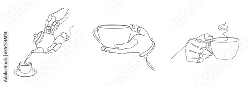 A cup of tea in the hands. Tea cups. Tea party.
