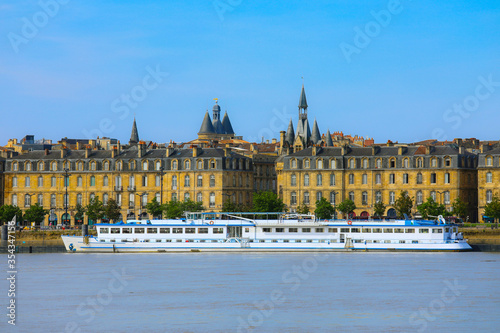 View of the old town in bordeaux city, typical, buildings from the other side of Garonne River, Bordeaux, France