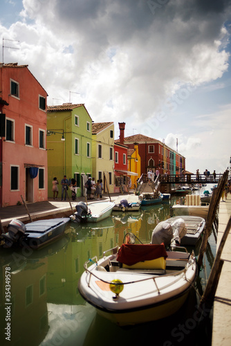 Canal through the Murano village in the Venice lagoon in Italy.  © Anna