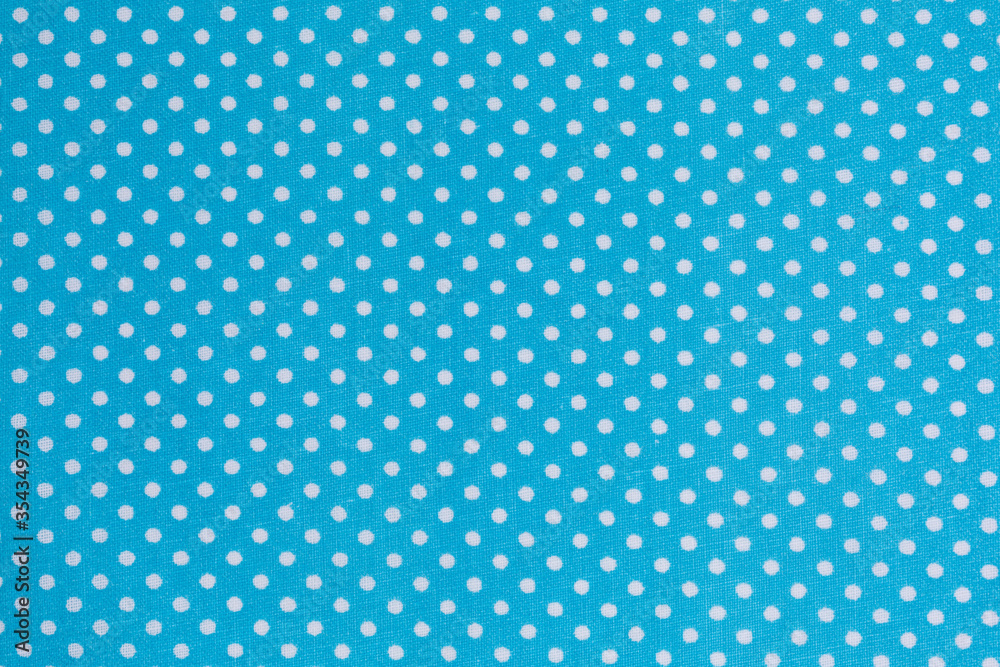 dotted tablecloth background in blue and white